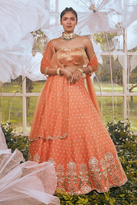 Embroidery Machine Orange Embroidered Net Lehenga at Rs 4999 in Surat