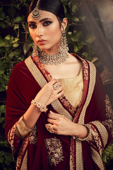 WedAbout - Dull gold lehenga with maroon dupatta and moti... | Facebook