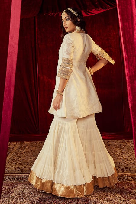 Shop Roze Ivory Dupatta Original Mukaish Organza, Kurta Silk Jodha Jacquard Peplum Set at Aza Fashions Shop_Roze_Ivory Dupatta Original Mukaish Organza, Kurta Silk Jodha Jacquard Peplum Set _at_Aza_Fashions