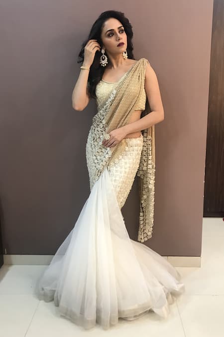 Champagne coloured Pre-draped lehenga saree with cutwork border and an  embroidered blouse. | Instagram