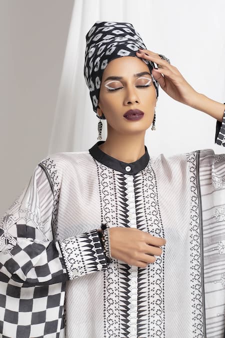 Rajdeep Ranawat_White Silk Mandarin Collar Kaftan Tunic And Draped Pant Set_at_Aza_Fashions