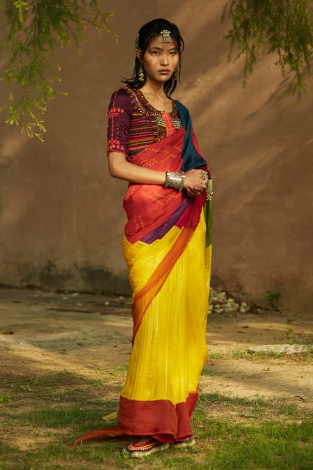Indian woman in beautiful saree Stock Photo by ©Gilitukha 100491624