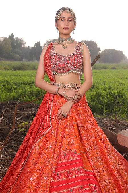 Aditi Gupta_Orange Lehenga Handwoven Banarasi Blouse Pure Silk Ikat Embroidered Set _at_Aza_Fashions