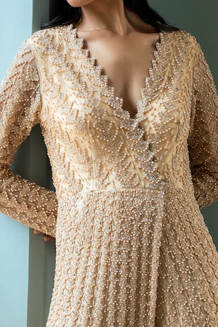Shivani Awasty_Beige Net Sequin, Bead V Neck Pleated Embroidered Gown _Online_at_Aza_Fashions