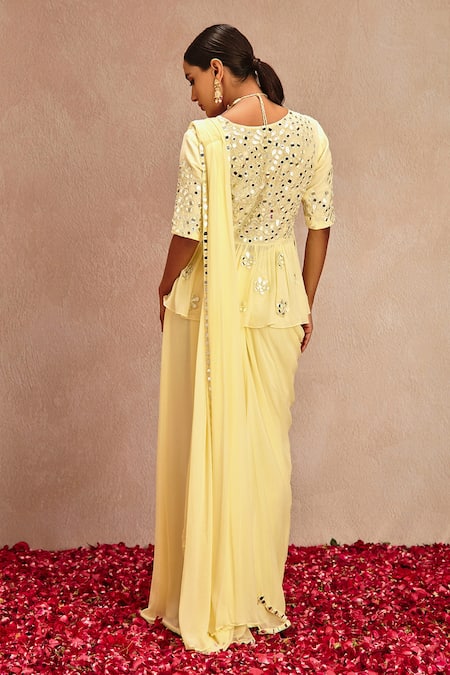 Shop Samatvam By Anjali Bhaskar Yellow Blended Georgette Mirror Work V Pre-draped Saree With Embroidered Peplum at Aza Fashions Shop_Samatvam By Anjali Bhaskar_Yellow Blended Georgette Mirror Work V Pre-draped Saree With Embroidered Peplum _at_Aza_Fashions
