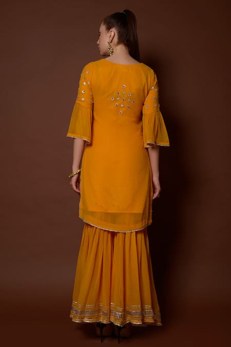 Shop_Surabhi Arya_Yellow Georgette Hand Embroidered Kurta And Gharara Set _at_Aza_Fashions