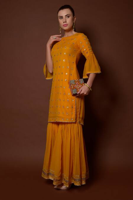 Buy_Surabhi Arya_Yellow Georgette Hand Embroidered Kurta And Gharara Set _Online_at_Aza_Fashions
