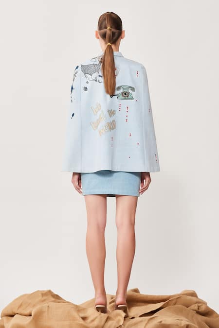 Shop Shahin Mannan Blue Thick Washed Denim Typography Shirt Collar Embroidered Cape at Aza Fashions Shop_Shahin Mannan_Blue Thick Washed Denim Typography Shirt Collar Embroidered Cape _at_Aza_Fashions