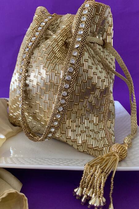 Shop Nayaab By Sonia Gold Embroidery, Tassels Salli En Vie Potli Bag at Aza Fashions Shop_Nayaab By Sonia_Gold Embroidery, Tassels Salli En Vie Potli Bag _at_Aza_Fashions