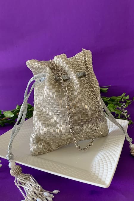 Shop Nayaab By Sonia Silver Embroidery, Tassels Salli En Vie Potli Bag at Aza Fashions Shop_Nayaab By Sonia_Silver Embroidery, Tassels Salli En Vie Potli Bag _at_Aza_Fashions