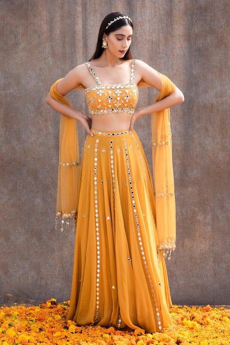 Silky Bindra_Yellow Net, Crepe, Shantoon Mirror, Nakshi Scoop Embellished Bridal Lehenga Set _Online_at_Aza_Fashions