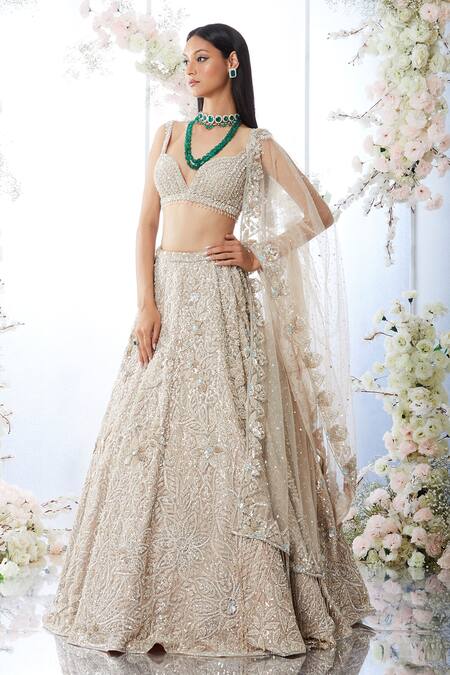 Seema Gujral_Beige Net Crystal, Sequin Plunge Floral Embroidered Bridal Lehenga Set_Online_at_Aza_Fashions