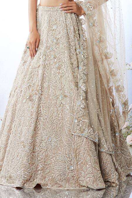 Shop_Seema Gujral_Beige Net Crystal, Sequin Plunge Floral Embroidered Bridal Lehenga Set_Online_at_Aza_Fashions