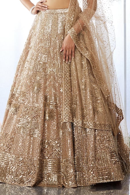 Seema Gujral_Beige Net Sequin Plunge V Neck Embroidered Bridal Lehenga Set _at_Aza_Fashions