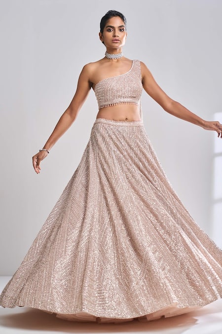 Shop Seema Gujral Gold Net Sequin, Pearl And Beads One Shoulder Blouse & Lehenga Set Online at Aza Fashions Shop_Seema Gujral_Gold Net Sequin, Pearl And Beads One Shoulder Blouse & Lehenga Set_Online_at_Aza_Fashions