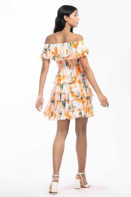 Shop Mandira Wirk Resort Peach Chiffon Floral Motifs One Shoulder Print Dress at Aza Fashions Shop_Mandira Wirk Resort_Peach Chiffon Floral Motifs One Shoulder Print Dress _at_Aza_Fashions