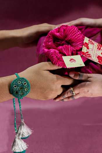 Show Shaa_Green Embroidered Raksha Sutra Rakhi_at_Aza_Fashions