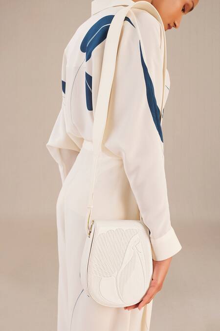 Buy Ampm Ivory Embroidery Zyna Peacock Embossed Sling Bag Buy_Ampm_Ivory Embroidery Zyna Peacock Embossed Sling Bag