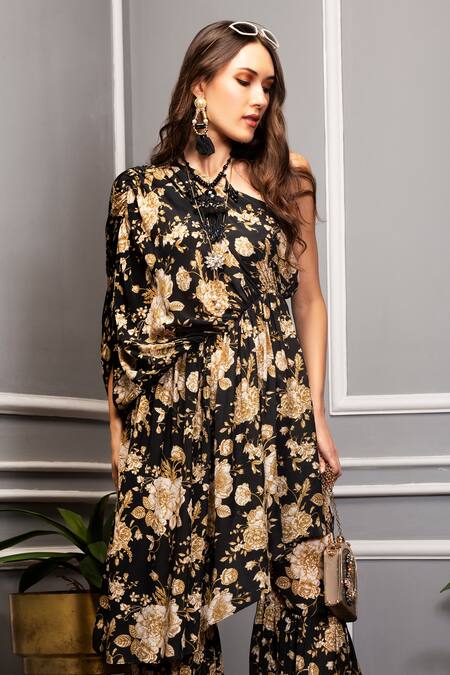 Buy_SAKSHI GIRRI_Black Crepe Floral Print One Shoulder Tunic And Sharara Set_Online_at_Aza_Fashions