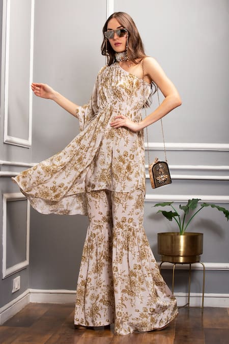 Sakshi Girri Beige Crepe Floral One Shoulder Tunic And Sharara Set 