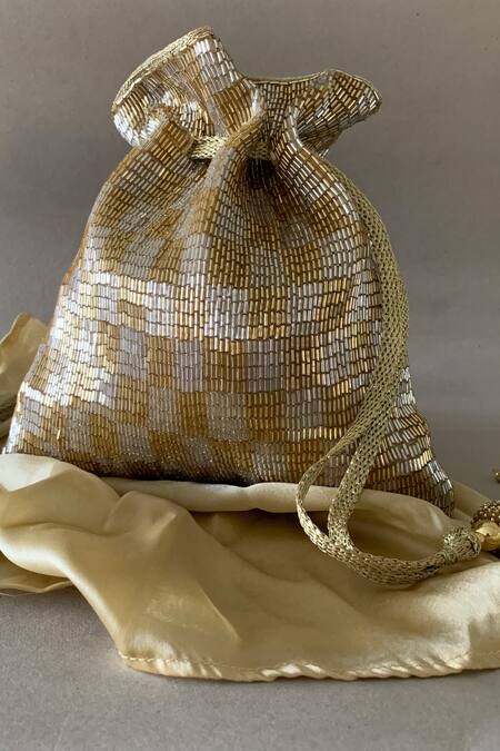 Shop Nayaab By Sonia Gold Embroidery, Stones, Tassels, Beads Shades Of Potli Bag at Aza Fashions Shop_Nayaab By Sonia_Gold Embroidery, Stones, Tassels, Beads Shades Of Potli Bag _at_Aza_Fashions