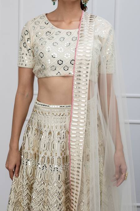 Shop Shian White Dupion Silk Pearl Round Leather Embellished Lehenga Set Online at Aza Fashions Shop_Shian_White Dupion Silk Pearl Round Leather Embellished Lehenga Set _Online_at_Aza_Fashions