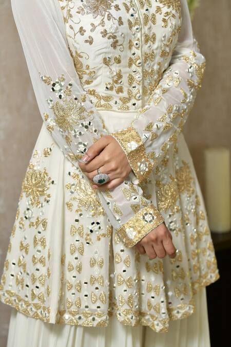Shop Shian Beige Georgette Zardozi Round Embroidered Peplum Sharara Set Online at Aza Fashions Shop_Shian_Beige Georgette Zardozi Round Embroidered Peplum Sharara Set _Online_at_Aza_Fashions