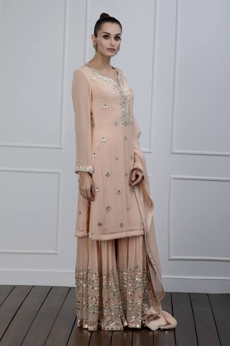 Shian Peach Georgette Mirror Work Notched Embroidered Gharara Set Online at Aza Fashions Shian_Peach Georgette Mirror Work Notched Embroidered Gharara Set _Online_at_Aza_Fashions