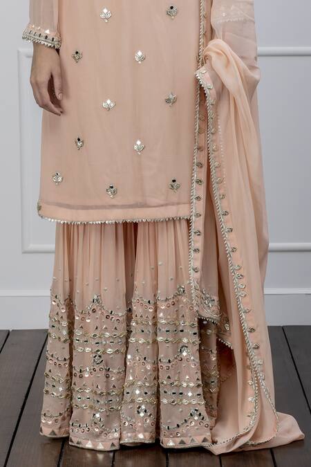 Buy Shian Peach Georgette Mirror Work Notched Embroidered Gharara Set Online at Aza Fashions Buy_Shian_Peach Georgette Mirror Work Notched Embroidered Gharara Set _Online_at_Aza_Fashions