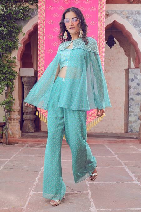 Show Shaa Blue Crepe Sequins Round Neck Splash Print Cape And Pant Set at Aza Fashions Show Shaa_Blue Crepe Sequins Round Neck Splash Print Cape And Pant Set _at_Aza_Fashions