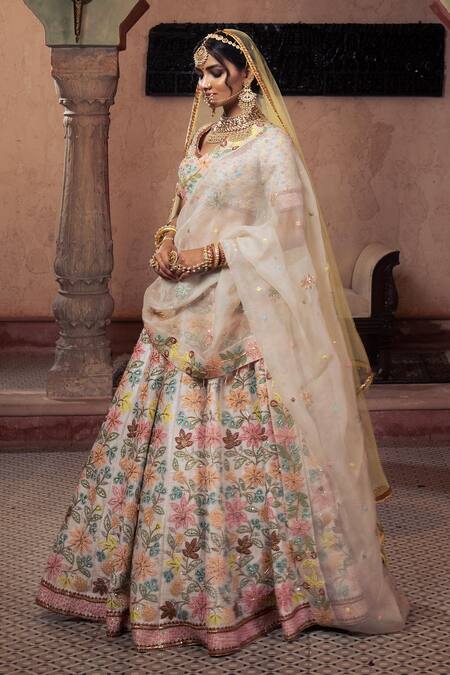 Buy Show Shaa Ivory Silk, Organza, Rayon Sequins, Embroidery Boat Floral Bridal Lehenga Set Online at Aza Fashions Buy_Show Shaa_Ivory Silk, Organza, Rayon Sequins, Embroidery Boat Floral Bridal Lehenga Set _Online_at_Aza_Fashions