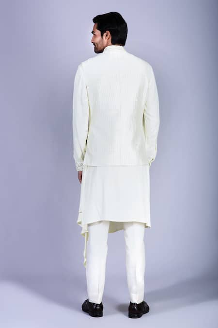 Shop Sarab Khanijou White Raw Silk Embroidered Bundi And Draped Kurta Set at Aza Fashions Shop_Sarab Khanijou_White Raw Silk Embroidered Bundi And Draped Kurta Set _at_Aza_Fashions