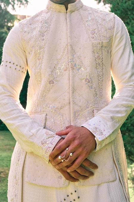 Shop Sarab Khanijou Ivory Bundi And Pant Sandwash Embroidery Floral & Geometric & Kurta Set at Aza Fashions Shop_Sarab Khanijou_Ivory Bundi And Pant Sandwash Embroidery Floral & Geometric & Kurta Set _at_Aza_Fashions