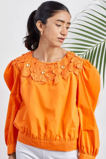 Buy Studio Moda India Orange Cotton 3d Applique Round Puff Sleeve Top Online at Aza Fashions Buy_Studio Moda India_Orange Cotton 3d Applique Round Puff Sleeve Top _Online_at_Aza_Fashions