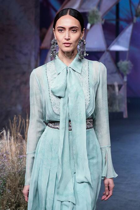 embroidered shirt and skirt