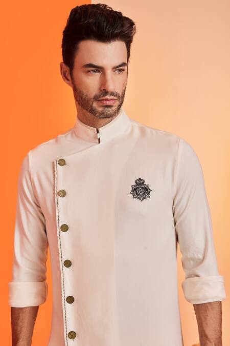 Shop_S&N By Shantnu Nikhil_Off White Lycra, Viscose, Terylene Crest Motif Embroidered Kurta_Online_at_Aza_Fashions