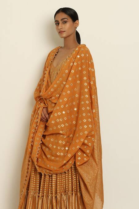 Seema Nanda Yellow Cotton Mul V Neck Embroidered Kurta at Aza Fashions Seema Nanda_Yellow Cotton Mul V Neck Embroidered Kurta _at_Aza_Fashions