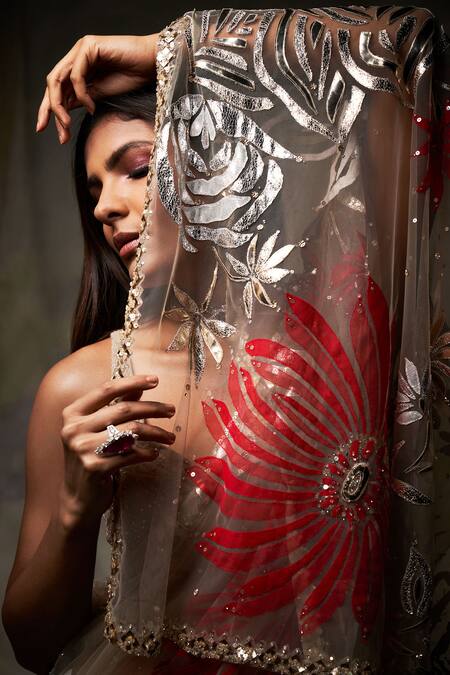 Seema Gujral_Beige Net V Neck Metallic Applique Saree With Blouse_at_Aza_Fashions