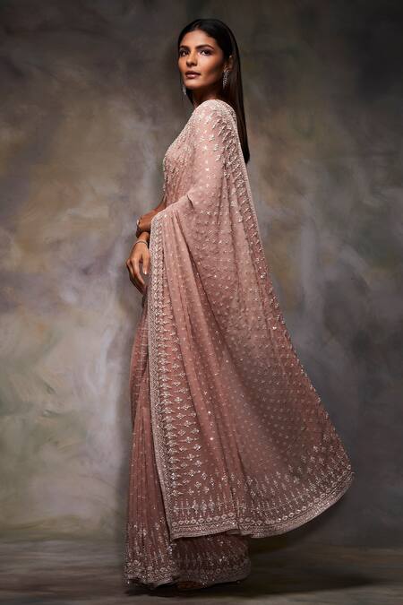 Seema Gujral_Peach Georgette V Neck Embellished Saree With Blouse_Online_at_Aza_Fashions