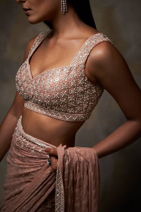 Seema Gujral_Peach Georgette V Neck Embellished Saree With Blouse_at_Aza_Fashions