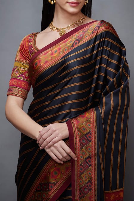 RI.Ritu Kumar Black Silk, Satin Lining Viscose Leaf Neck Striped Saree With Blouse at Aza Fashions RI.Ritu Kumar_Black Silk, Satin Lining Viscose Leaf Neck Striped Saree With Blouse _at_Aza_Fashions