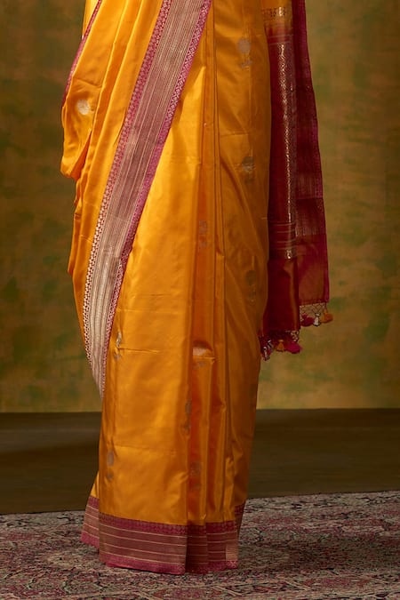 Buy Weaver Story Orange Handloom Katan Silk Banarasi Saree Online at Aza Fashions Buy_Weaver Story_Orange Handloom Katan Silk Banarasi Saree_Online_at_Aza_Fashions