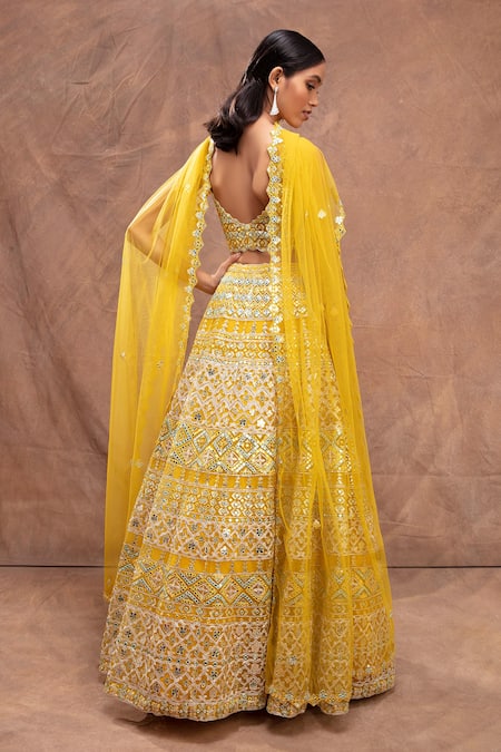 Shop Aneesh Agarwaal Yellow Net V Neck Foil Applique Embroidered Bridal Lehenga Set at Aza Fashions Shop_Aneesh Agarwaal_Yellow Net V Neck Foil Applique Embroidered Bridal Lehenga Set _at_Aza_Fashions