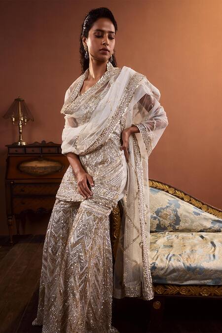 Buy_Seema Gujral_Ivory Net Sequins, Chevron Pattern Sweetheart Neck Embroidered Kurta Gharara Set_Online_at_Aza_Fashions