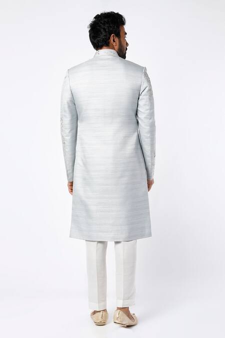 Shop_Nero by Shaifali and Satya_Blue Silk Embroidered Floral Motifs Sherwani Set _at_Aza_Fashions