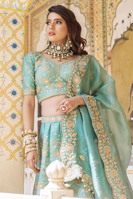 Surbhi Shah Blue Organza, Pure Raw Silk Floral Motifs V Neck Embroidered Bridal Lehenga Set Online at Aza Fashions Surbhi Shah_Blue Organza, Pure Raw Silk Floral Motifs V Neck Embroidered Bridal Lehenga Set _Online_at_Aza_Fashions