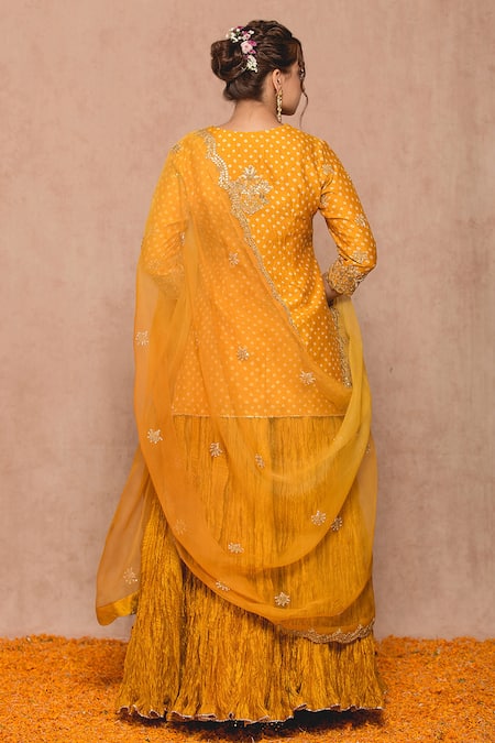Surbhi Shah Yellow Cotton Embroidered Zardozi Work Round Notched Bandhej Kurta Lehenga Set Online at Aza Fashions Surbhi Shah_Yellow Cotton Embroidered Zardozi Work Round Notched Bandhej Kurta Lehenga Set _Online_at_Aza_Fashions