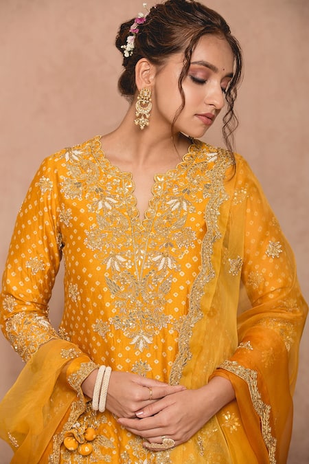 Surbhi Shah Yellow Cotton Embroidered Zardozi Work Round Notched Bandhej Kurta Lehenga Set at Aza Fashions Surbhi Shah_Yellow Cotton Embroidered Zardozi Work Round Notched Bandhej Kurta Lehenga Set _at_Aza_Fashions