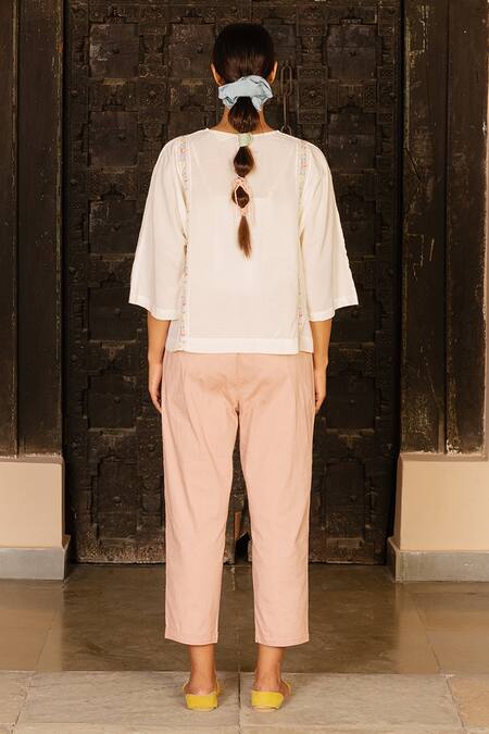 Shop Ayaka White 100% Organic Cotton Dobby Made With Bamboo Fibres Floral Round Neck Top at Aza Fashions Shop_Ayaka_White 100% Organic Cotton Dobby Made With Bamboo Fibres Floral Round Neck Top _at_Aza_Fashions