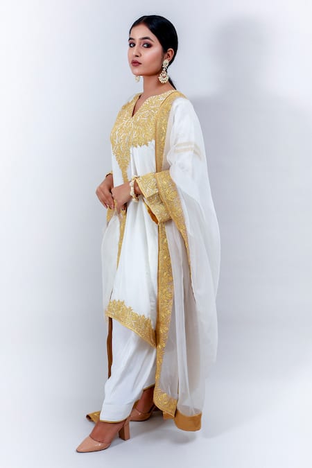 Shop Daljit Sudan White Crepe And Organza Tilla Notched Embroidered Phiran Kurta Pant Set at Aza Fashions Shop_Daljit Sudan_White Crepe And Organza Tilla Notched Embroidered Phiran Kurta Pant Set _at_Aza_Fashions